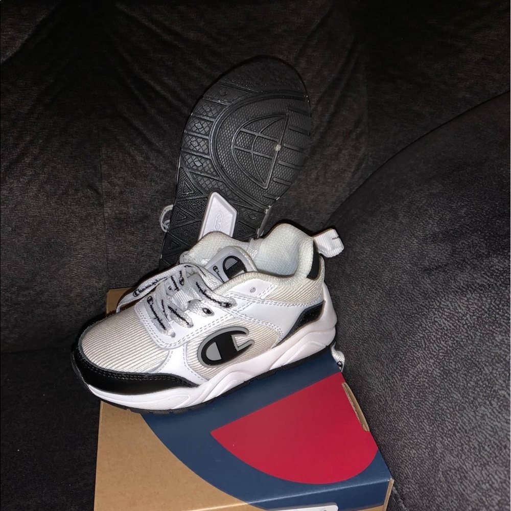 Black and white champion sneakers